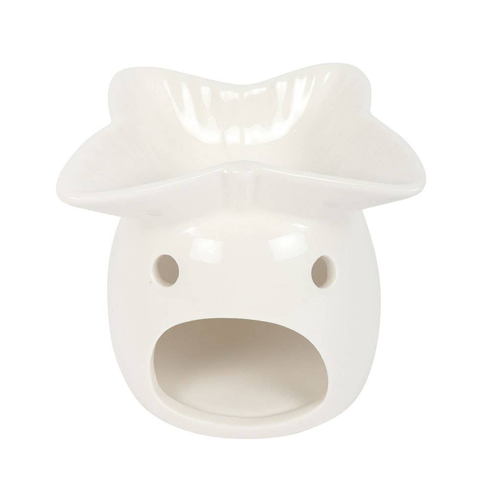White ceramic animal-shaped warmer on a white background