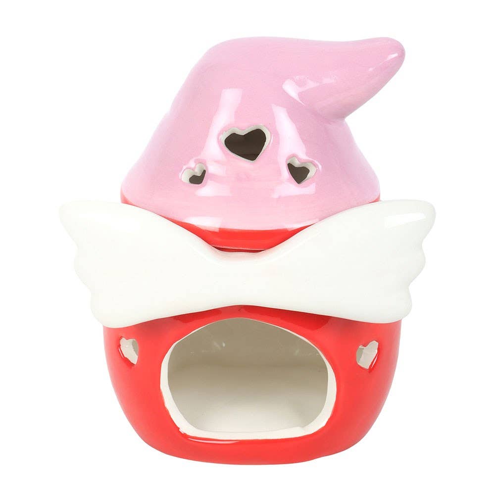Ceramic cat house with pink roof and red body on a white background