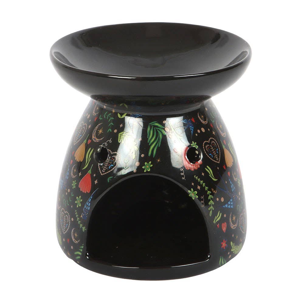 Black ceramic oil burner with colorful designs on a white background