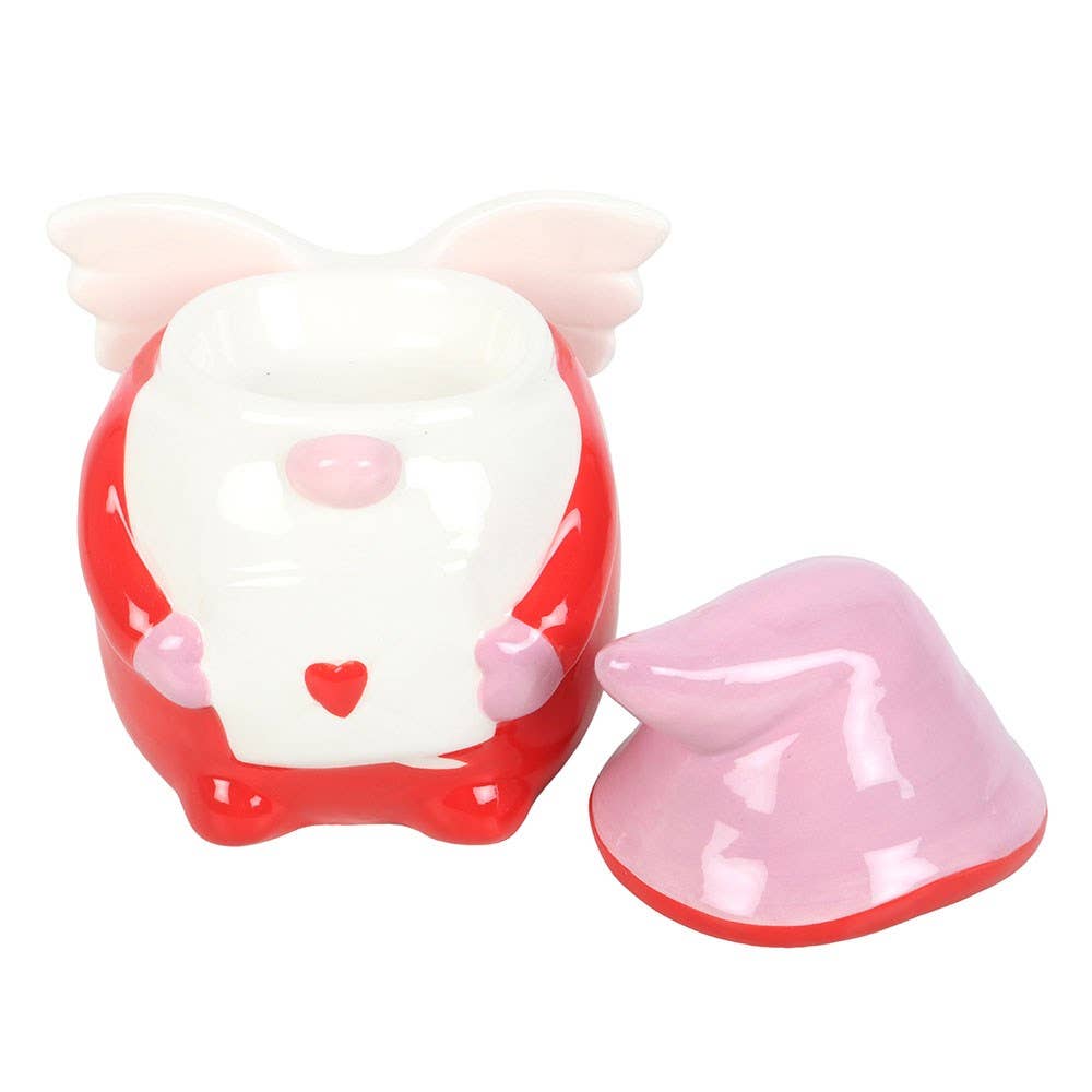 Cute character with red body, white face, and pink heart-shaped shoes on a white background